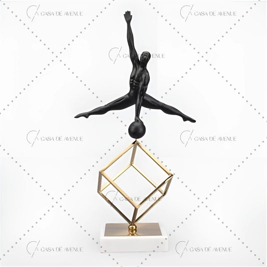 A Man Balancing On A Footbal